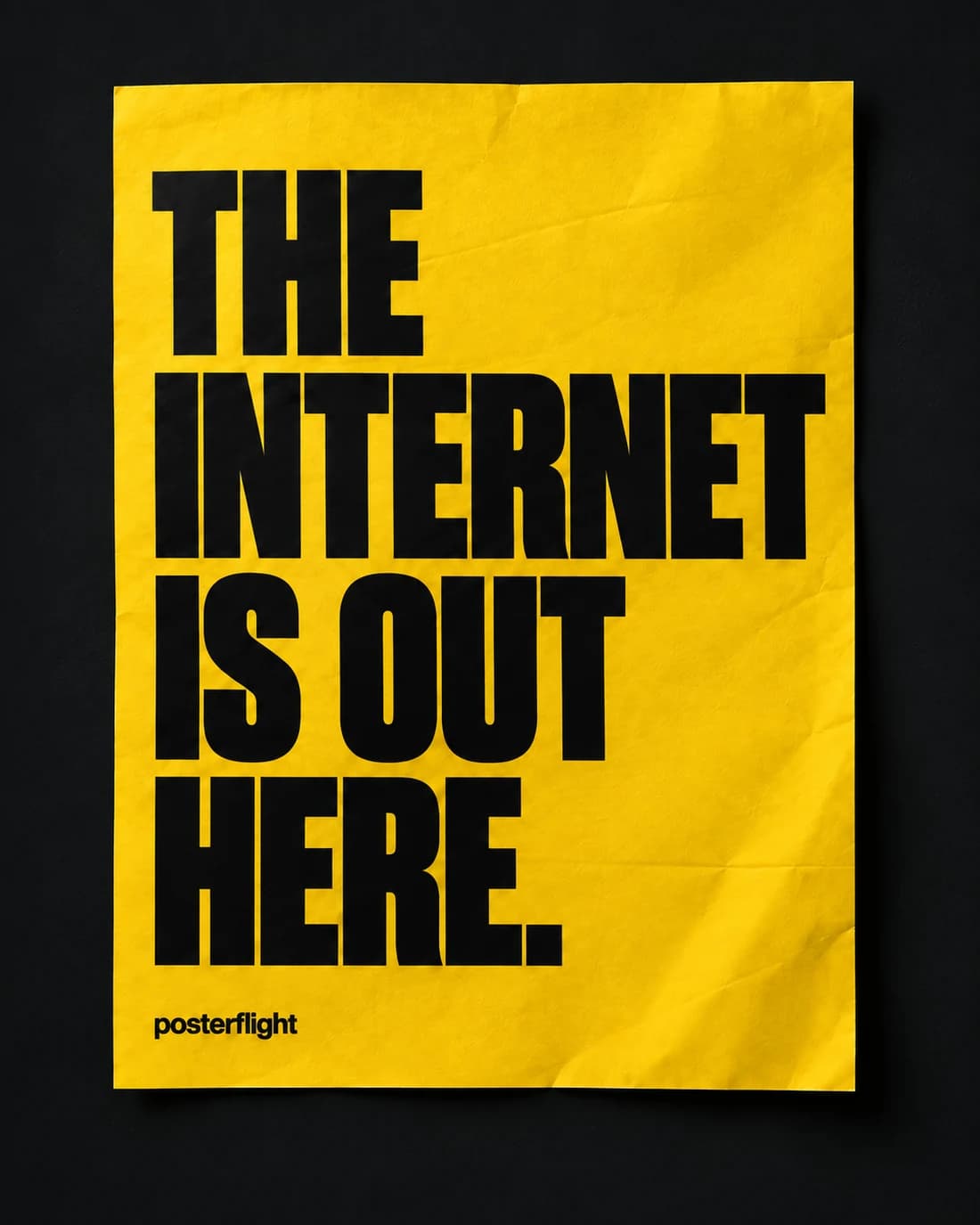 A yellow PosterFlight concept poster with oversized black lettering: The internet is out here.